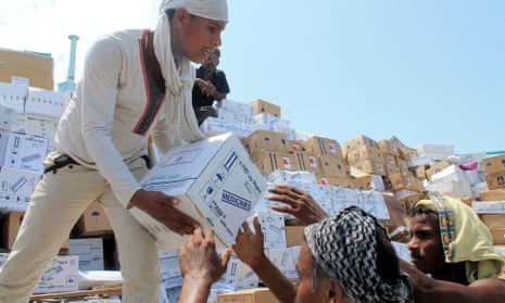 Medical boxes unloaded from a boat carrying relief aid in Aden last year