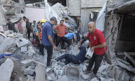 People search through rubble