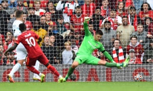 Sadio Mane finishes a fine move to score the second.