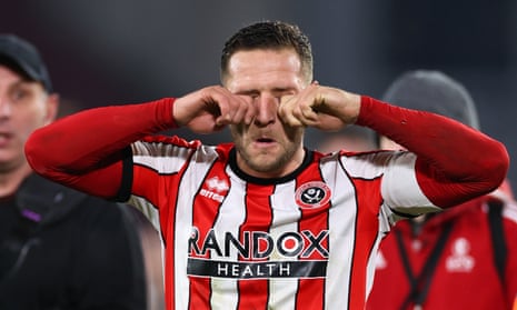 Billy Sharp taunts the Wrexham fans at full time after scoring in Sheffield United’s 3-1 FA Cup win.
