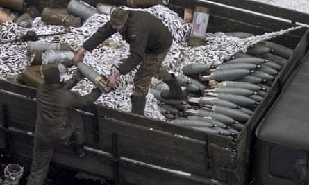 Ukrainian soldiers unload ammunition in Avdiivka