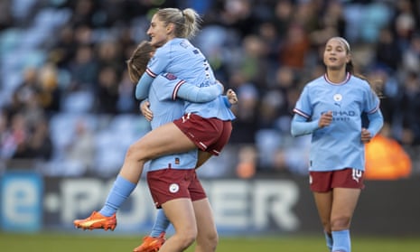 Laura Coombs of Manchester City celebrates making it 3-0 against Brighton