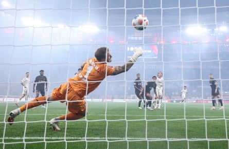 Can Uzun of Eintracht Frankfurt scores against Leverkusen