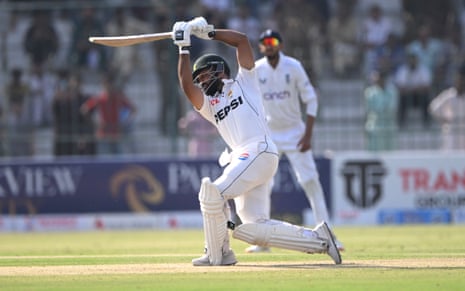 Pakistan batsman Abdullah Shafique drives to reach his century