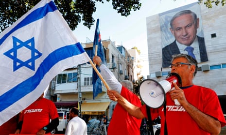 Supporters of the Israeli Labor party at a rally against  Benjamin Netanyahu outside the Likud party HQ in Tel Aviv.