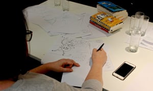Teachers and librarians draw characters with direction from Gary Northfield at the Guardian Education Centre Reading for pleasure conference 28 March 2019