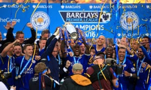 Leicester’s Wes Morgan and Claudio Ranieri lift the Premier League in 2016