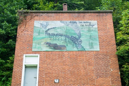 A painting, mural on a brick building, recognizing coal’s heritage, history. In Clinchfield coal mining town, Dante, Virginia.