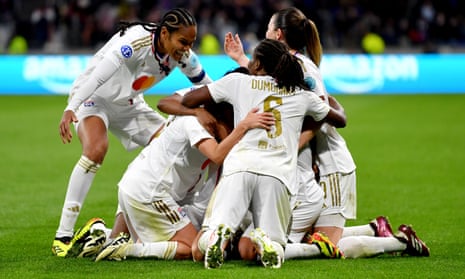 Amel Majri of Olympique Lyonnais celebrates scoring her team's third and winning goal.