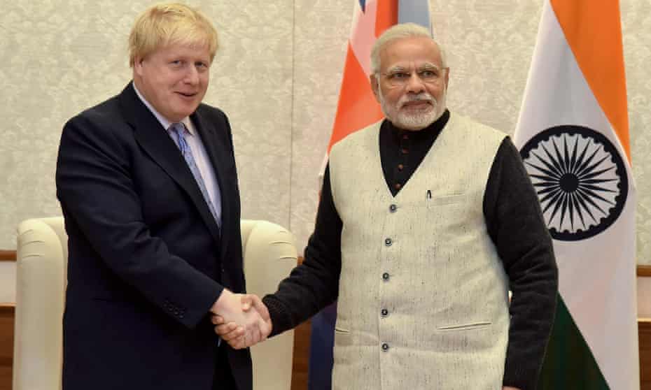 Boris Johnson (left) shakes hands with the Indian prime minister, Narendra Modi, in New Delhi in January 2017