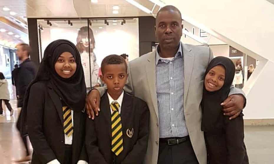 Idris Hamud with his daughters Sumayyah and Ilham, and his son.