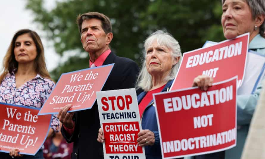 Opponents of the academic doctrine known as critical race theory protest outside the Loudoun County School Board headquarters, in Ashburn, Virginia, on June 22, 2021.