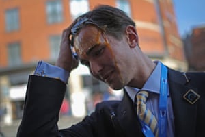 A Tory delegate is hit by an egg