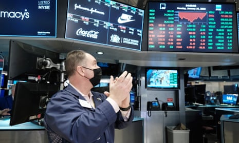 A trader on the New York stock exchange. The Dow Jones at one point lost over 1,000 points on Monday before ending up just over 100.