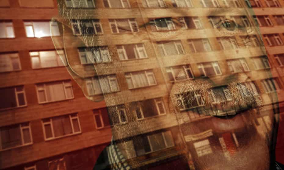 A building in Istanbul is reflected on a poster of president Recep Tayyip Erdoğan, whose government is leading the crackdown.