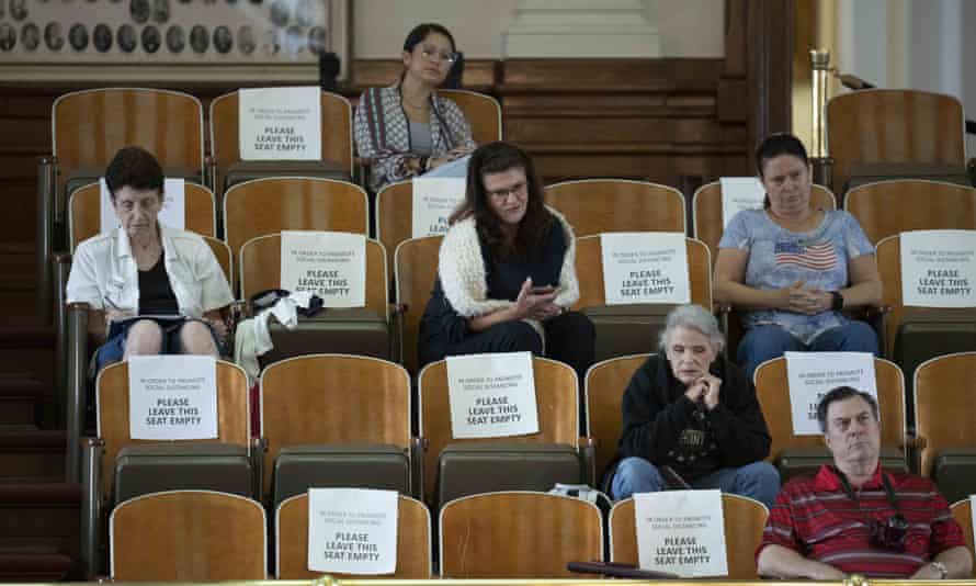 Spectators listen in the gallery as the Texas house debates SB 1. Democrats condemned the legislation.