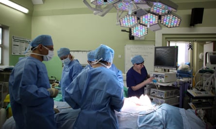 surgeons in operating theatre
