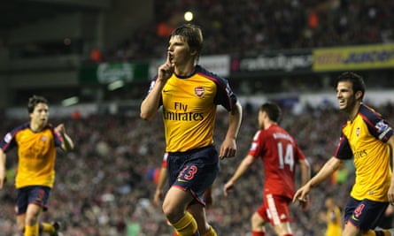 Andrey Arshavin (centre) celebrates after scoring the first of his four goals for Arsenal at Anfield in 2009