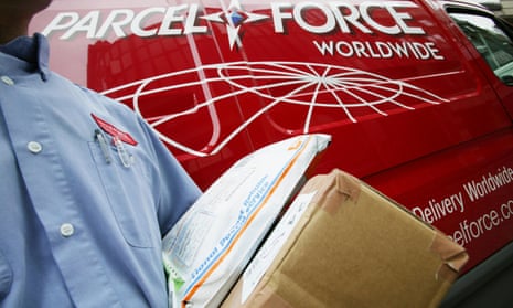 A Parcelforce worker delivering packages in London