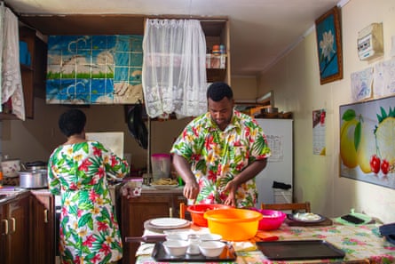 Waqavuki and his mother make lamb curry at home.
