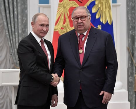 Russian president Vladimir Putin shakes hands with Russian businessman and founder of USM Holdings Alisher Usmanov during an awarding ceremony at the Kremlin in Moscow, Russia in 2018.