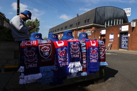 A tat tycoon displays his wares outside Selhurst Park.
