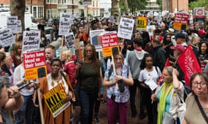 Hundreds of demonstrators gather to demand the resignation of Kensington and Chelsea councillors in the aftermath of the Grenfell Tower fire