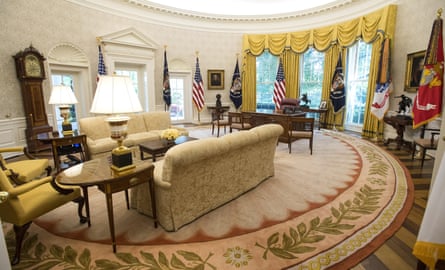Gold-hued … the renovated Oval Office with unstripy wallpaper.