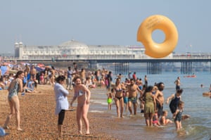 Large crowds on Brighton beach.