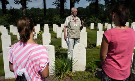 Jan Loos, from Oosterbeek talks to visitors about the second world war at the town's Airborne Museum. Netherlands.
