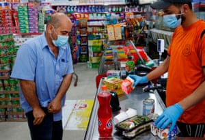 A Palestinian man shops at a mini-market in Gaza City amid restricted movement due to increasing cases of Covid-19. The new cases raised alarm bells this week in the sealed-off enclave that has weathered the pandemic relatively well so far.