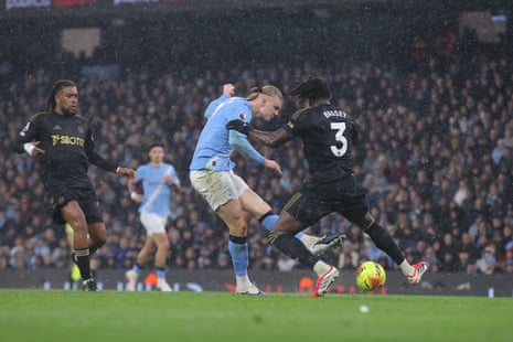 Erling Haaland fires home Manchester City's third goal against Fulham.