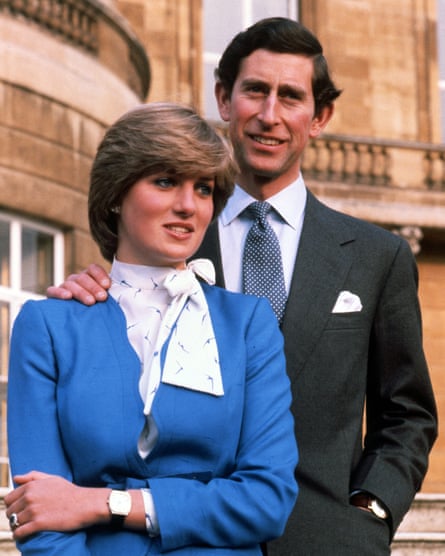Lady Diana Spencer and Prince Charles, Prince of Wales pose for photographs following the announcement of their engagement in the grounds of Buckingham Palace on February 24, 1981 in London