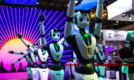Robots dance this month in Shanghai at an international conference on AI, the growth of which has caused a sharp rise in the price of tech shares