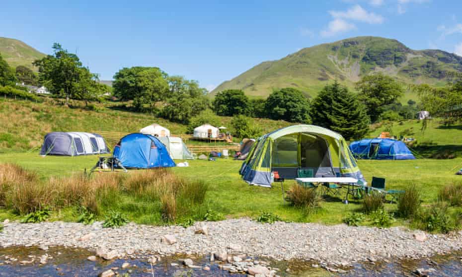 People camping at Syke Farm campsite, Buttermere, Cumbria