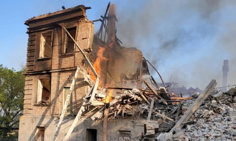 Partially collapsed building after a school was hit by Russian bombs in the village of Bilohorivka, Luhansk.