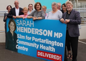 Liberal Corangamite MP Sarah Henderson poses with election material carrying no Liberal party branding