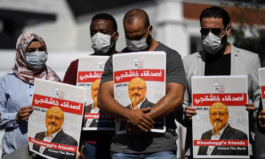 Friends of Jamal Khashoggi hold posters bearing his picture as they attend an event on the second anniversary of his assassination, in front of the Saudi Arabian consulate in Istanbul in October.