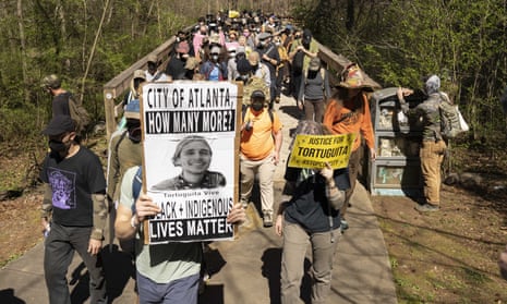 activists march against Cop City