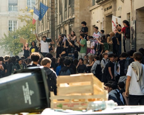 French high school students gather outside the Lycee Sophie Germain high school in Paris, France.