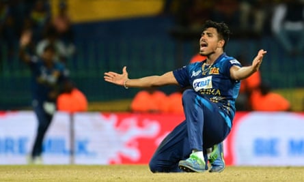 Sri Lanka’s Maheesh Theekshana celebrates after taking the wicket of Bangladesh’s Taskin Ahmed in September.