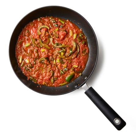 Add the tomatoes, plus a pinch of sugar, if you think they’ll need it. Simmer gently until the colour of the tomatoes darkens and some, but not all of the liquid has evaporated.