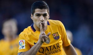 Luis Suarez celebrates scoring his hat-trick.