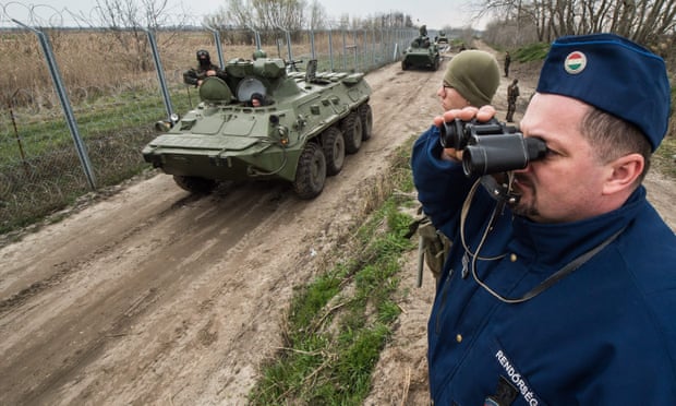 Hungarian troops on patrol earlier this year along the border fence Hungary erected to stop migrants and refugees.