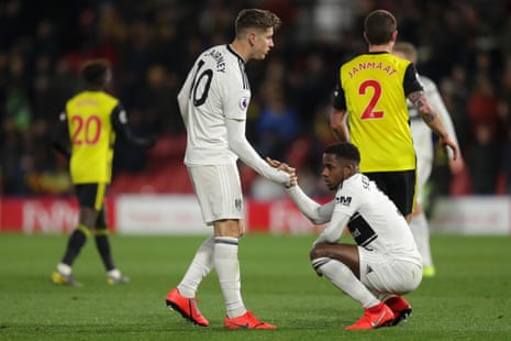 Tom Cairney and Ryan Sessegnon dejected as Fulham are relegated.