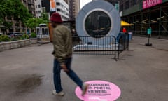 Video "Portal" Between New York And Dublin Shut Down After Lewd Behavior<br>NEW YORK, NEW YORK - MAY 15: People pass a video "Portal" art installation connecting New York City and Dublin, Ireland via a 24/7 video livestream which sits temporarily shut down in the Flatiron Plaza on May 15, 2024 in New York City. The "Portal", a Flatiron NoMad Partnership, has been temporarily shut down after two weeks for "inappropriate behavior" from a small group of individuals on both sides of the Atlantic. The livestream will once again be opened by the end of the week. (Photo by Spencer Platt/Getty Images)