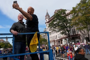 Senators Cory Booker and Adam Schiff attend a No Kings protest in Washington DC.