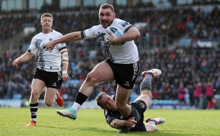 Rich Lane on his way to scoring the second of his three tries for Bristol