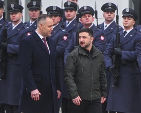 Karol Nawrocki and Volodymyr Zelenskyy walk past the honour guards during a welcome ceremony at the Presidential Palace in Warsaw, Poland last year.