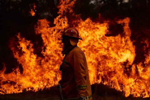 A CFA Member works on controlled back burns along Putty Road